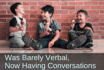 Young boy sitting with friends. Text: Was barely verbal, now having conversations.
