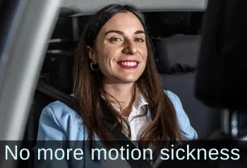 Woman lying on red mat. Text: No more motion sickness