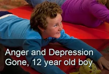 Boy laying on a red mat. Text: Anger and Depression gone 12 year old boy.